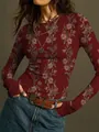 Detail shot of vintage floral print on a burgundy ribbed knit long-sleeved t-shirt - S / Tops / Burgundy