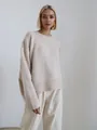 Pull en maille beige oversize pour femme avec coupe décontractée et finition avoine douce - S / Hauts / Abricot