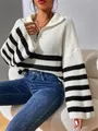 Detail of a white and black striped knit sweater with a zip-up collar and jeans. - S / Tops / White