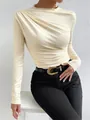 Elegant cream slim-fit women's top featuring a unique pleated shoulder design detail. - S / Apricot