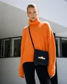 Women's oversized orange turtleneck sweater with thick knit for autumn and winter. - Orange