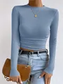 Detail view of a slim-fit blue waffle-knit long-sleeve top with elegant ruched waist - S / Tops / Sky Blue