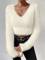 Close-up of white fuzzy V-neck cropped sweater with soft faux fur texture - S / Tops / Apricot
