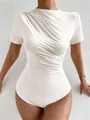 Detail view of a white slim-fit ruched short sleeve bodysuit for women. - S / Tops / White