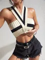 Detailed macro view of a slim fit color-block halter neck ribbed knit sweater vest for women - S / Tops / Black and White