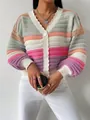 Close-up detail of color-block knit cardigan featuring rainbow stripes and lantern sleeves. - S / Tops / Rainbow Stripe