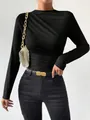 Detail view of a black slim-fit long-sleeve bodysuit with elegant shoulder ruching - S / Tops / Black