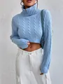 Close-up detail of women's blue turtleneck cable-knit cropped sweater showing fit - S / Tops / Blue