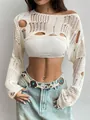 Detailed macro view of white hollowed-out crochet knit shrug with distressed chic design - S / Tops / White