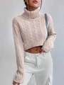Close-up detail of a pink turtleneck cable knit cropped sweater with long sleeves for women - S / Tops / Light Pink