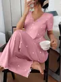 Detailed view of pink heart pattern ribbed pajamas set with short sleeves and pants. - S / Top And Bottom / Pink