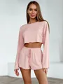 Women's pink ribbed knit crop top and shorts two-piece loungewear set close-up view - S / Top And Bottom / Pink