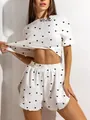 White knit pajama set with heart print featuring short sleeve top and split shorts - S / Top And Bottom / Black Heart
