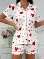 Two-piece white pajama set featuring a red heart print and short sleeves for women. - S / Top And Bottom / Red