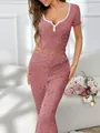 Elegante tweedelige dames pyjama set met bloemenprint, V-hals en golvende randen - Oranjerood