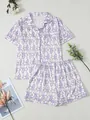 Zweiteiliger Damen-Schlafanzug mit lila Affen-Print, Kurzarm-Oberteil und passenden Shorts - S / Oberteil Und Unterteil / Hellviolett