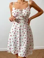 Sleeveless white spaghetti strap loungewear dress with red cherry print and bow tie detail - S / Bottoms / Cherry