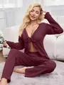 Sexy burgundy tie-front long sleeve pajama set for women shown in lifestyle setting - S / Top And Bottom / Burgundy