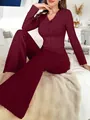 Detailed view of the burgundy ribbed fabric on the long-sleeve top and trousers lounge set - S / Top And Bottom / Red