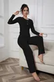 Elegant black ribbed long sleeve lounge set for women shown in a cozy home interior - S / Top And Bottom / Black