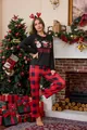 Festive women's Christmas pajama set featuring a Santa print and red buffalo plaid pants. - Black Buffalo Plaid (W11109-3)