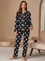 Women's black polka dot pajama set with long sleeve button-down top and matching pants. - S / Top And Bottom / Black