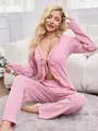 Sexy pink textured tie-front cardigan and pants pajama set in a cozy indoor home setting - Pink