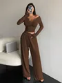 Fashionable woman wearing a brown long sleeve v-neck crop top and wide leg pants set - S / Top And Bottom / Brown