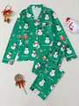 Close-up of green Christmas pajama set with festive snowman and bow pattern print. - S / Top And Bottom / Green