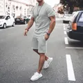 Model wearing light gray men's summer short sleeve and shorts set in casual style - Light Gray
