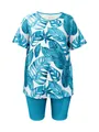 Detailed look at women's summer 2-piece set with tropical leaf print and blue casual shorts. - 1XL / Top And Bottom / Blue