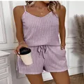 Close-up detail of a purple ribbed two-piece lounge set with camisole and shorts. - S / Top And Bottom / Light Purple