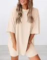 Close-up of a casual beige two-piece lounge set featuring a ribbed t-shirt and shorts. - Apricot