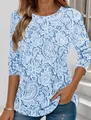 Vista dettagliata della t-shirt da donna a maniche lunghe con stampa floreale bianca - Taglia S / Top / Bordo in Pizzo Celeste