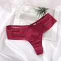 Close-up of wine red ice silk seamless thong with striped mesh texture - M / Bottoms / Burgundy