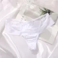 Close-up of white seamless ice silk thong with striped mesh side panels on satin fabric - M / Bottoms / White