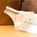 Elegant beige seamless thong with hollow-out fishnet mesh waistband detail for women - M / Bottoms / Nude