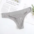 Grey seamless thong underwear for women featuring cat-eye cutouts and perforated design - One Size / Thong (002) / Gray
