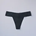 Sexy black lace thong featuring a V-shape low waist and seamless design for women - S / Bottoms / Black
