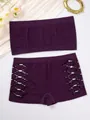 Detailed view of a purple seamless bandeau and hollow-out panty set on a decorative background - S / Top And Bottom / Purple