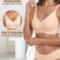 Nude seamless wireless bra featuring a deep V-neck and decorative wavy scalloped edge details. - S / Tops / Nude