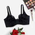 Elegant black lace underwire bra featuring a delicate decorative floral pattern detail - 36/80C / Tops / Black