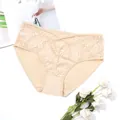 Detailed view of beige lace panties with criss-cross waist and floral embroidery. - 0XL / Beige