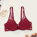 Detailed view of a sexy burgundy push-up bra with mesh panels and lettered straps. - 34/75B / Burgundy