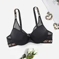 Detailed shot of a sexy black push-up bra featuring stylish letter printed straps. - 34/75B / Black
