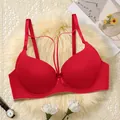 Elegant red push-up bra for women featuring a delicate center bow and sexy strappy back - Red