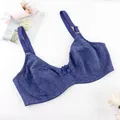 Close-up of a navy blue full coverage bra featuring floral patterns and a cute central bow - 44E/100E / Tops / Blue