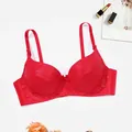 Elegant red push-up bra featuring bow detail and textured cups, shown on a white background - 34/75B / Tops / Red