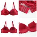 Red lace bra for women featuring delicate floral patterns and adjustable straps. - 34/75 / Tops / D Cup / Red