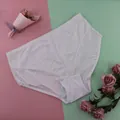 White plus size seamless lace panties with breathable fabric and elegant floral pattern - 4XL / Bottoms / White